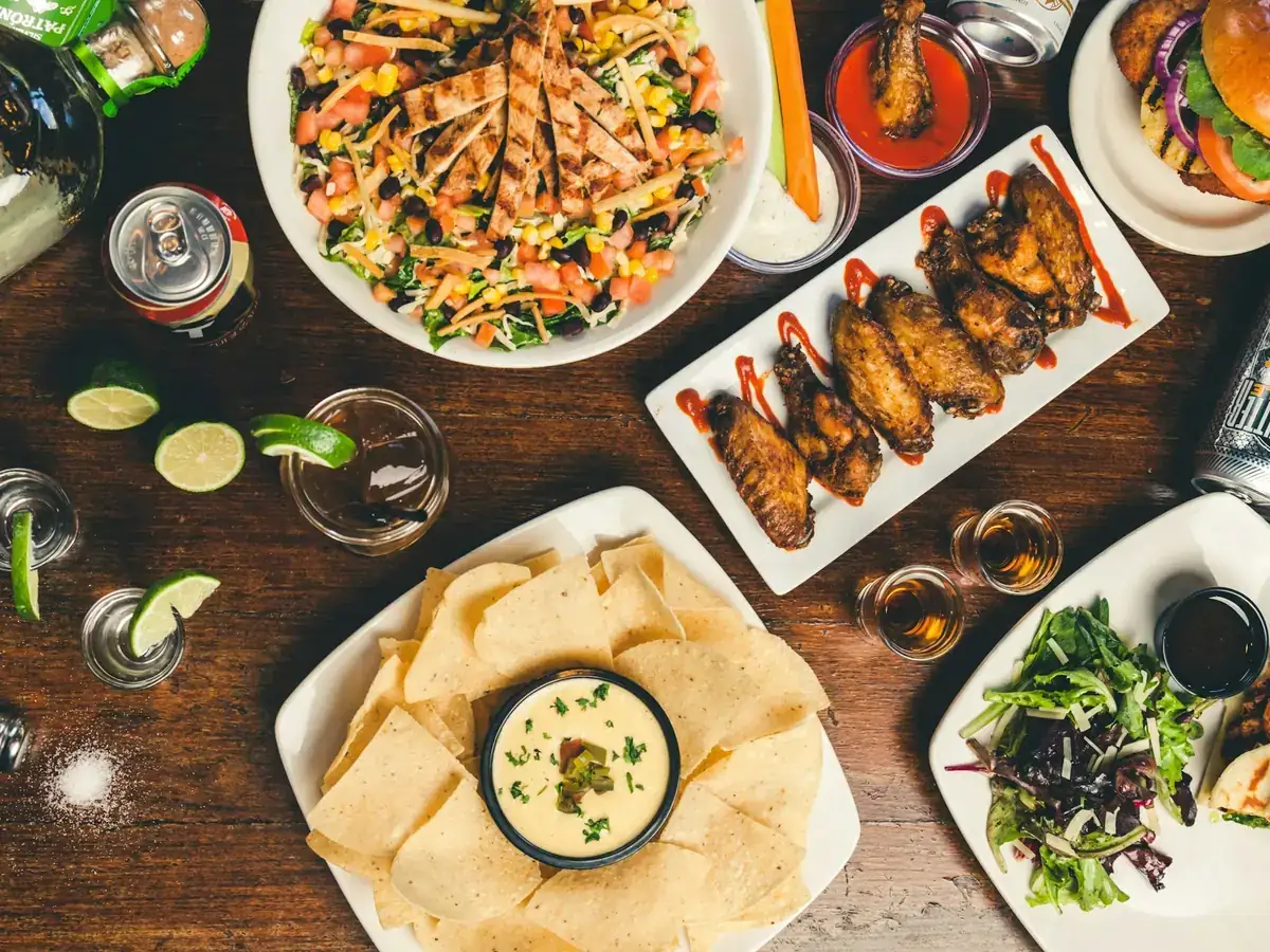Overhead spread of restaurant dishes for an on-demand food delivery app